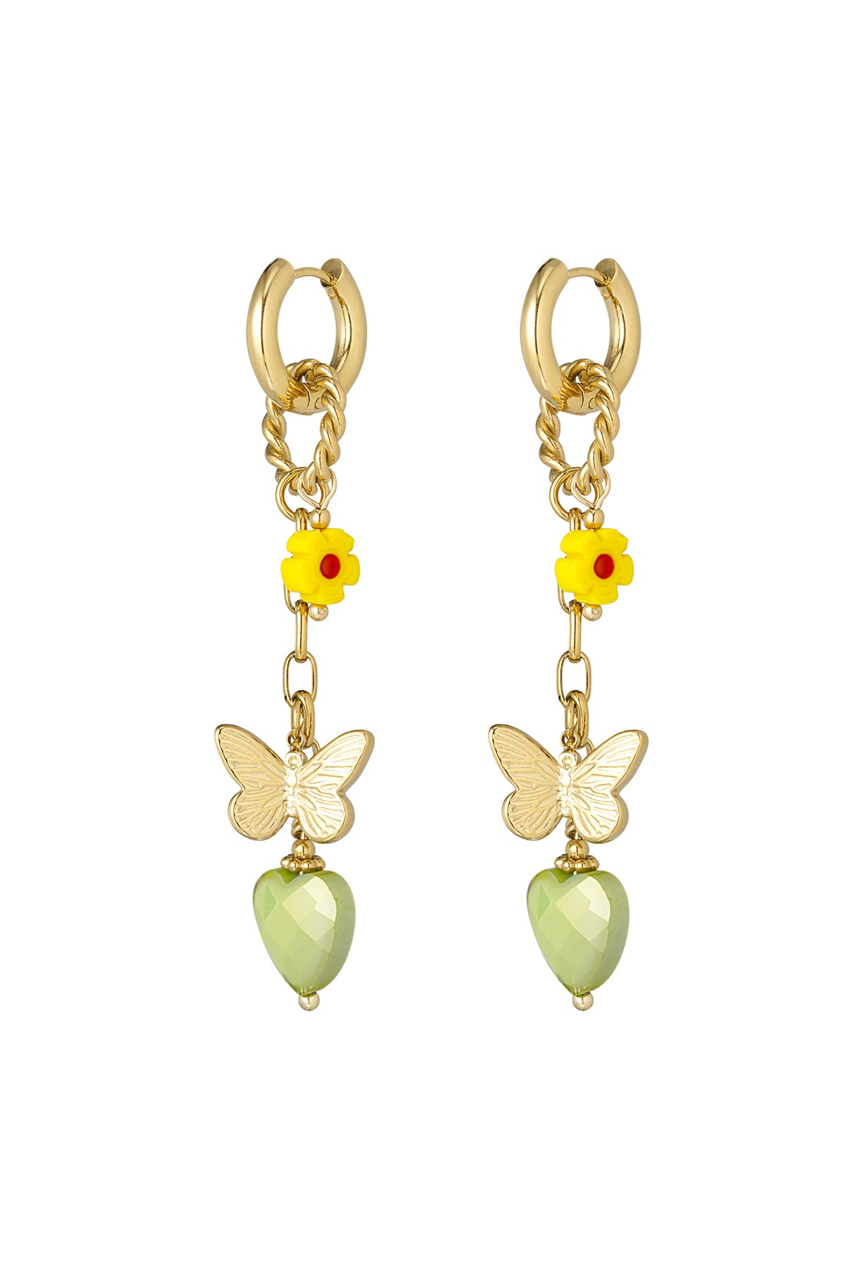 Gold drop earrings with yellow flower, butterfly charm, and faceted light green heart pendant on white background