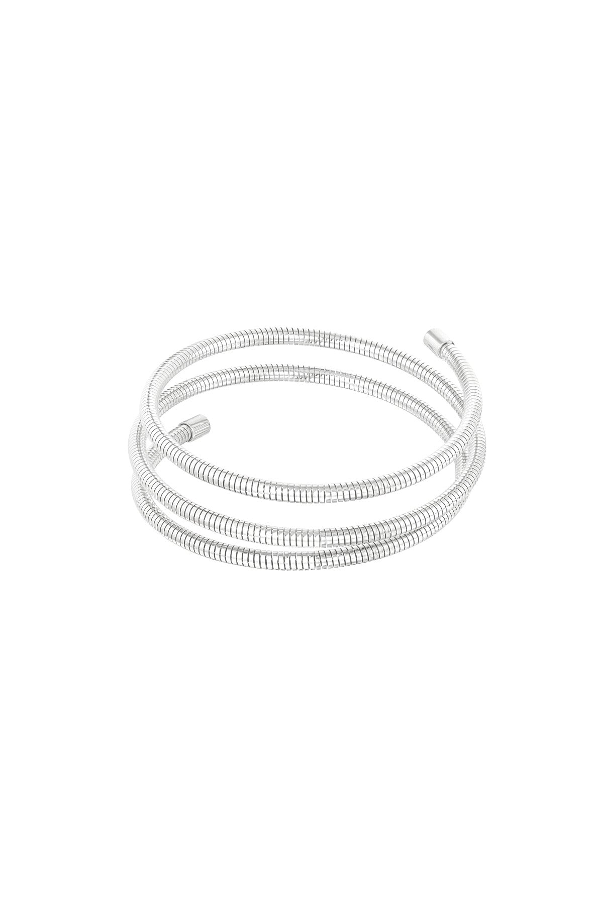 Silver spiral coil cuff bracelet with three flexible loops isolated on white background