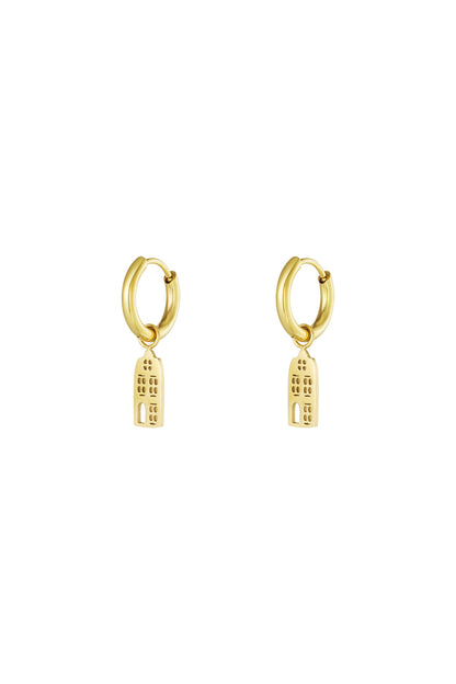 Pair of gold drop hoop earrings with architectural building-shaped charms on a white background