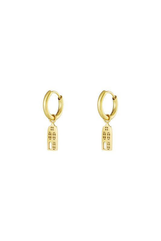 Pair of gold drop hoop earrings with architectural building-shaped charms on a white background