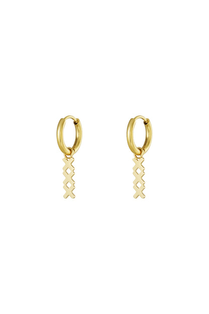 Pair of gold geometric hoop drop earrings with a dangling interlocking X pendant on a white background