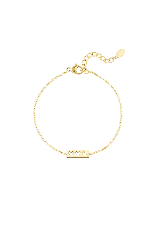 Close-up image of a gold triple X minimalist bracelet with adjustable chain and lobster clasp on white background