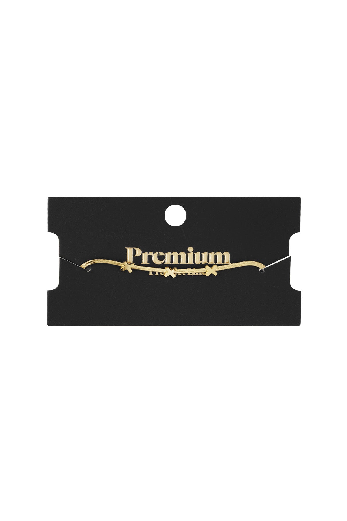 Triple X charm bracelet displayed on black boutique packaging card