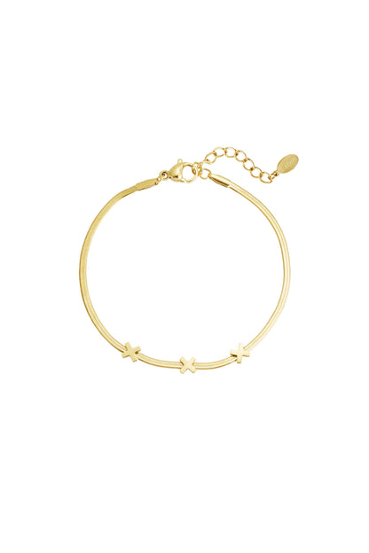 Gold triple X charm bracelet with smooth chain and lobster clasp on white background