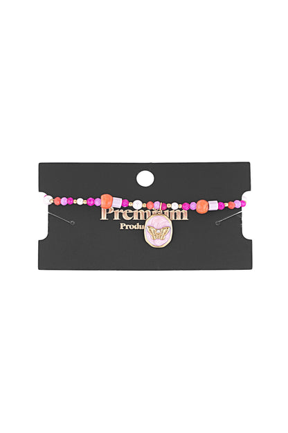 Butterfly charm beaded bracelet displayed on a black product card showcasing its colorful beads and gold clasp