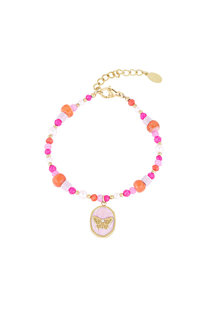 Colorful beaded bracelet with pink, orange, and white beads and a gold butterfly charm pendant on a white background