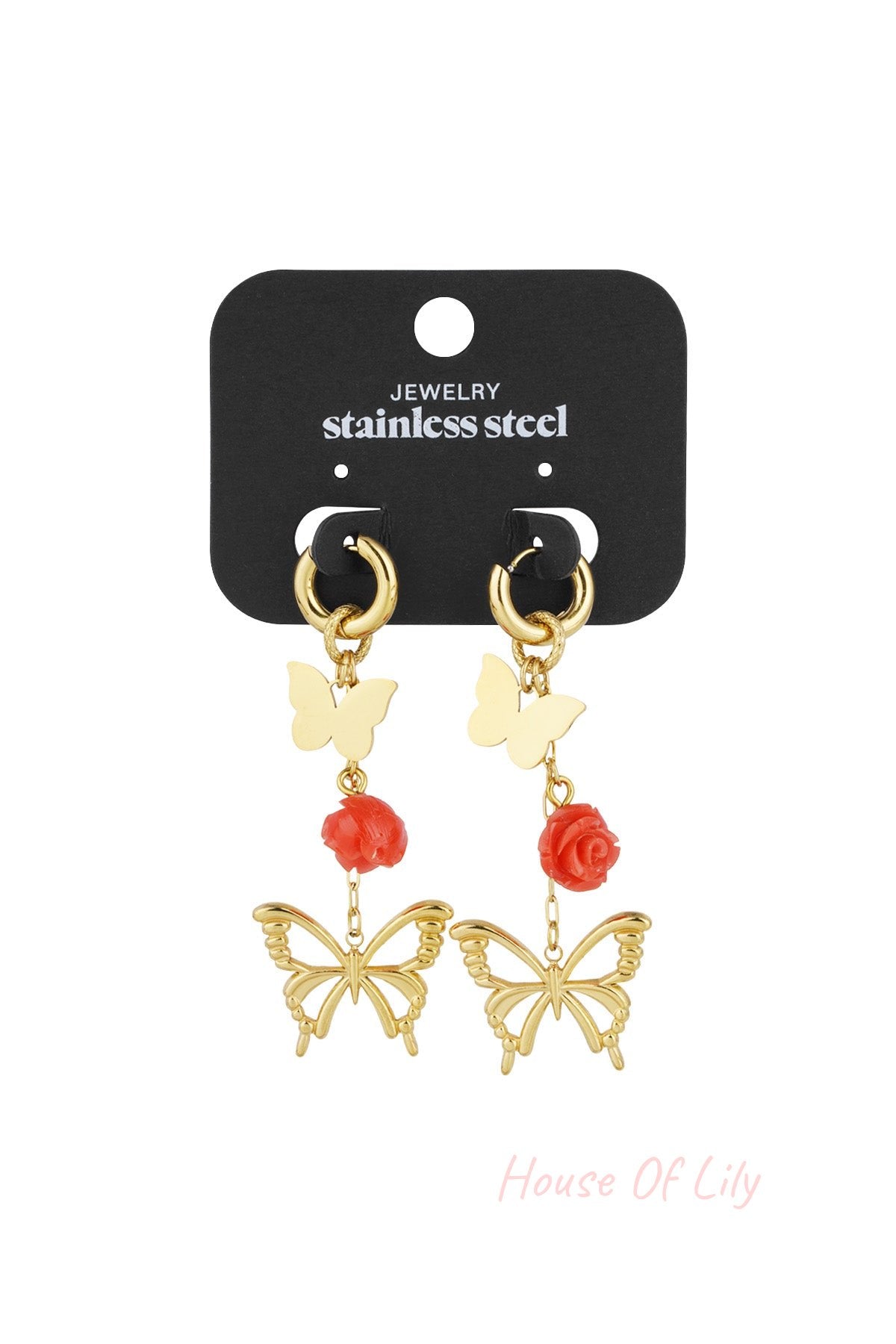 Gold butterfly and rose drop earrings displayed on black card labeled stainless steel