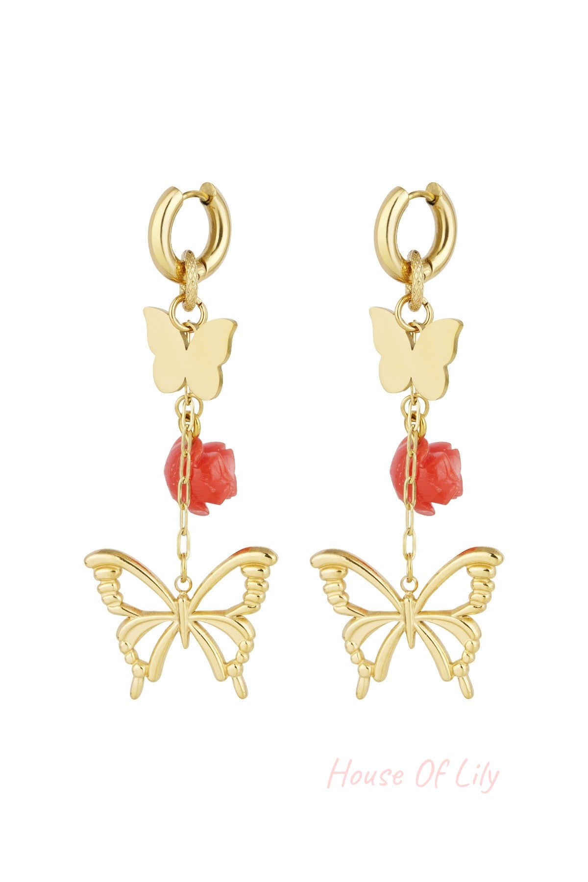 Pair of gold butterfly and rose drop earrings with chain links on a white background