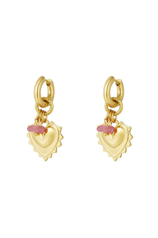Pair of gold drop earrings featuring heart-shaped charms and small pink stone beads
