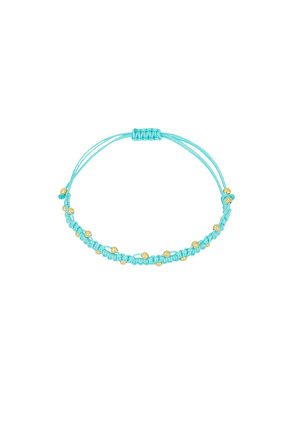 Close-up of aqua braided bead bracelet on white background