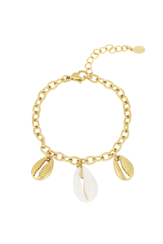 Gold chain bracelet with three shell charms: two gold-tone and one white natural shell on a white background