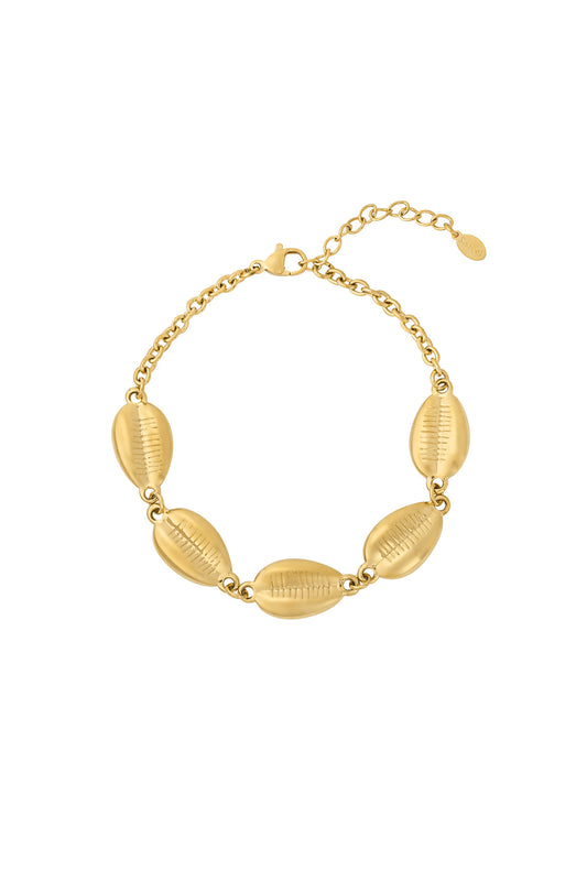 Gold-tone stainless steel bracelet featuring five detailed cowrie shell-shaped charms linked by a fine chain against a white background