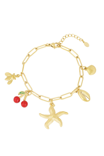 Gold charm bracelet with chain links and beach-themed charms including starfish, bee, cherry, seashell, and cowrie shell on white background