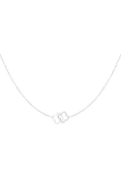Silver interlinked clover pendant necklace on white background