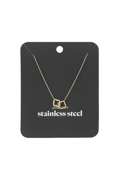 Gold interlinked clover pendant necklace displayed on black stainless steel jewellery card