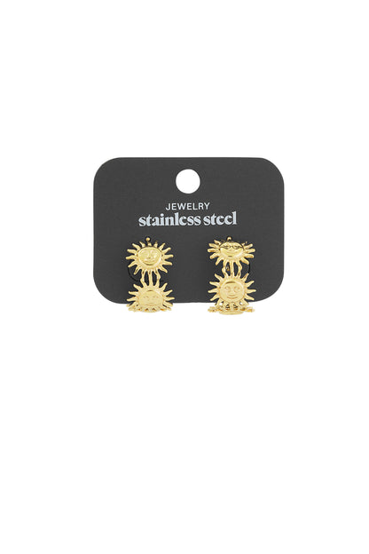 Gold-tone sun motif hoop earrings attached to black retail card labeled stainless steel jewelry