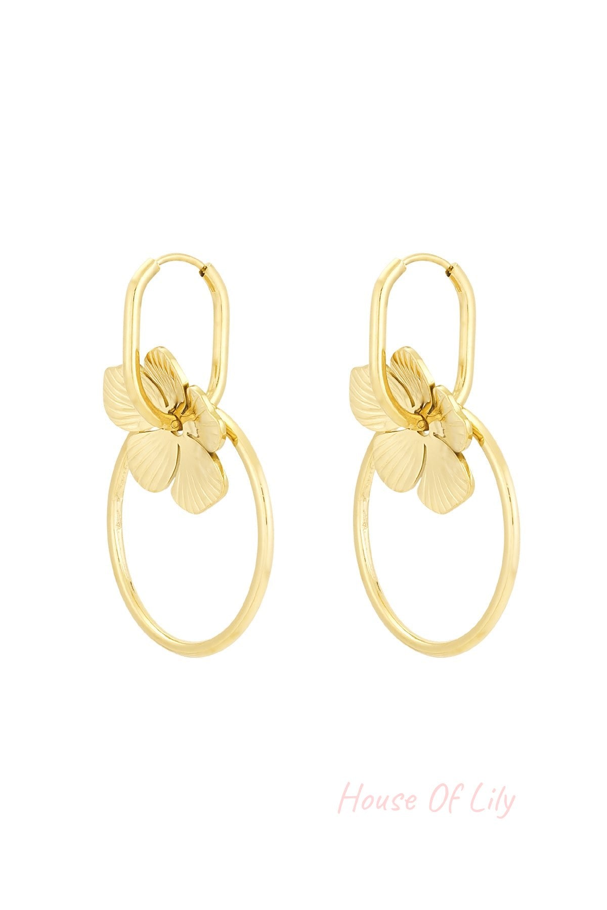 Pair of gold-tone floral hoop drop earrings with flower charms and circular hoops on white background