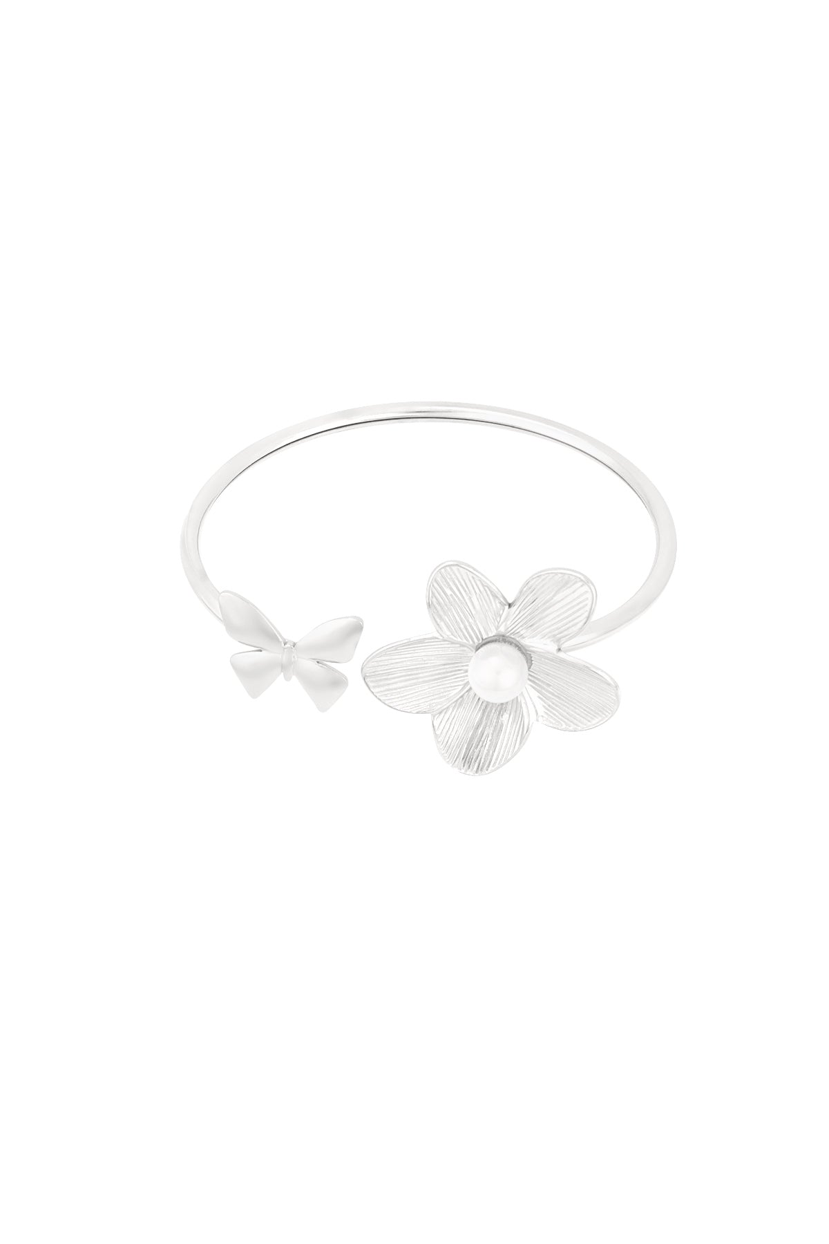 Silver cuff bracelet with butterfly and flower design featuring a pearl center on white background
