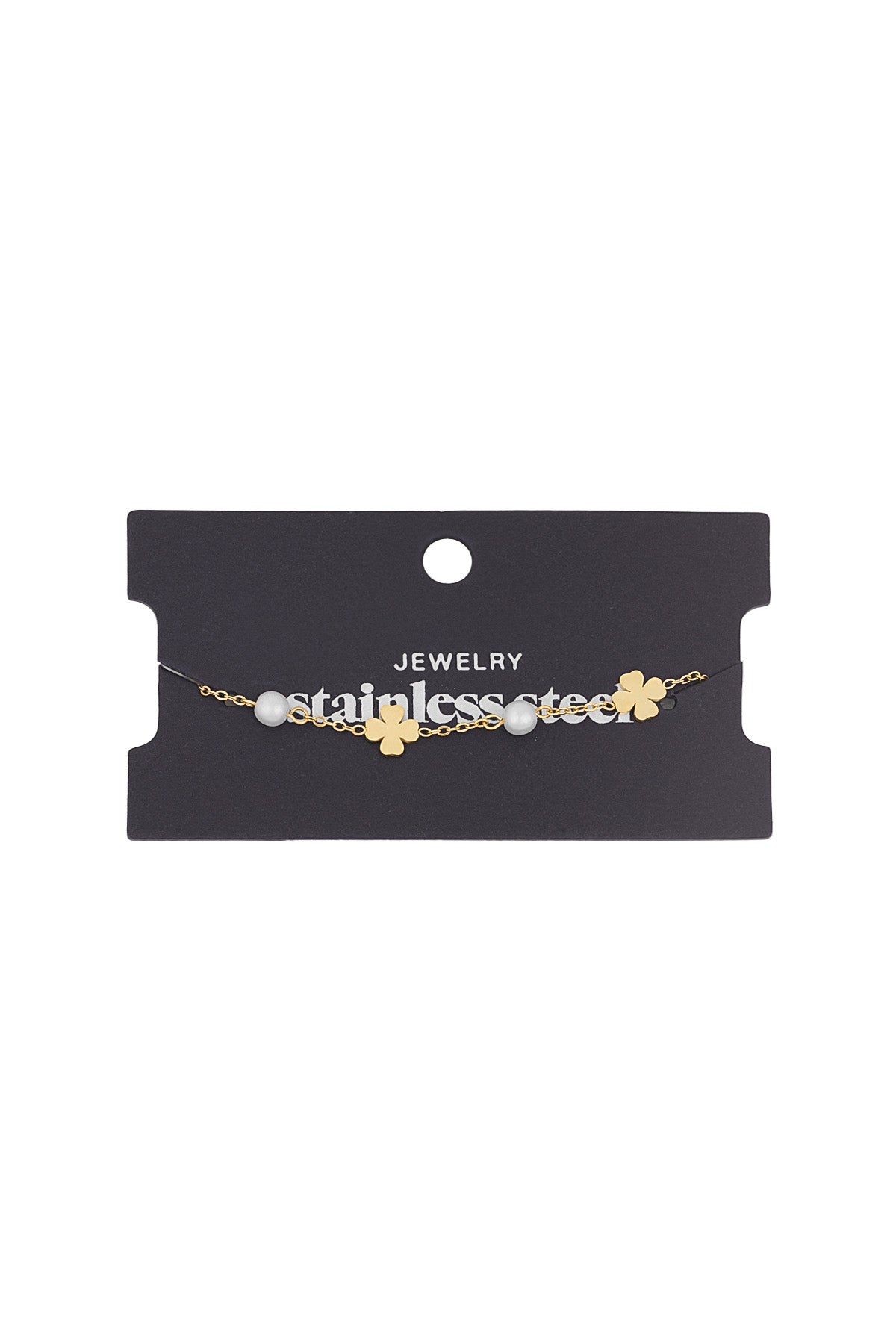 Gold clover and pearl charm bracelet displayed against a black jewellery card labelled stainless steel
