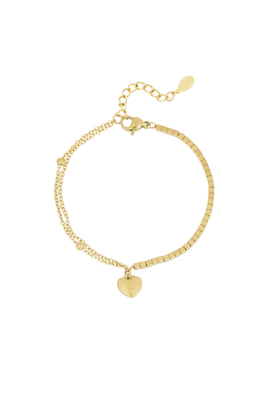 Gold stainless steel heart charm bracelet with mixed chain and square beads design on white background