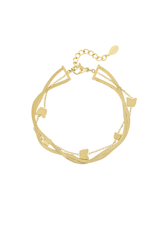 Gold butterfly charm bracelet with layered thin chains and adjustable clasp laid flat on white background