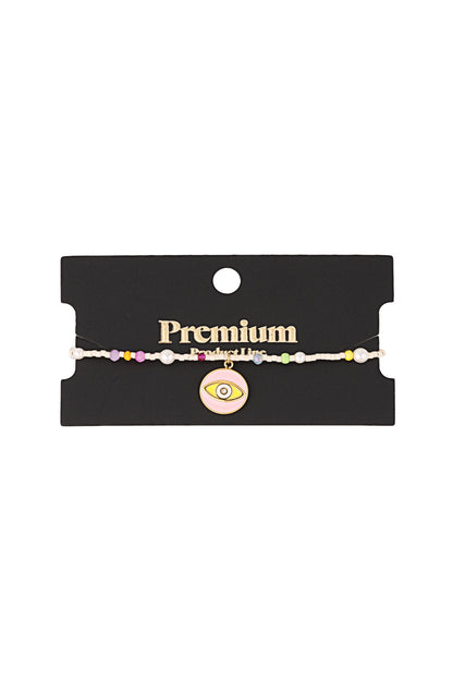 Beaded bracelet displayed on black premium product card showing colorful beads and eye charm