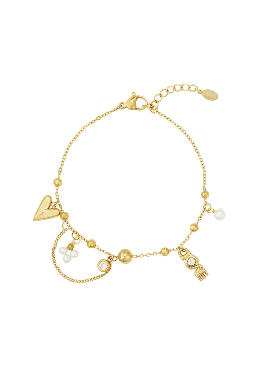Gold-tone charm bracelet with heart, LOVE lettering charm with crystal, faux pearl clusters, and small gold beads on a fine chain
