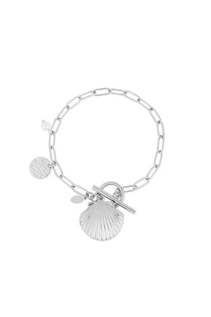 Silver-tone charm bracelet with shell pendant, pearl detail and toggle clasp on white background