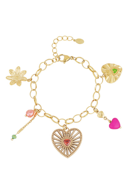 Gold charm bracelet with heart, pink heart, flower and colourful bead charms laid flat