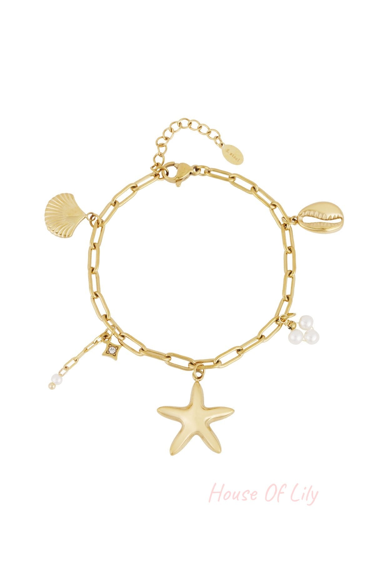 Gold-tone chain link charm bracelet featuring starfish, seashell, cowrie shell and pearl cluster charms laid flat on white background