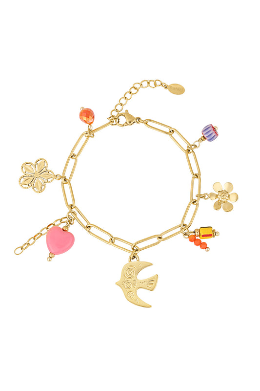 Golden link bracelet with flower, bird, heart, and colourful charm beads on white background