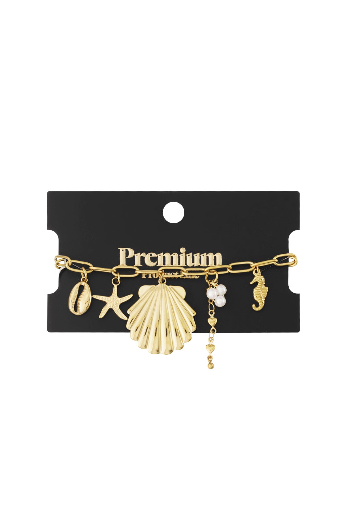 Golden charm bracelet displayed on black branded card packaging showing beach-themed charms
