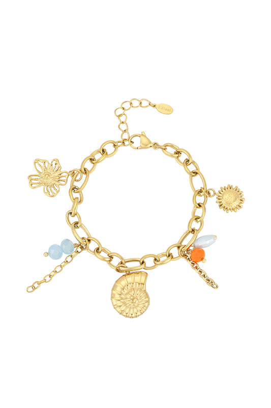 Gold-plated charm bracelet with sun, starfish, shell, spiral shell charms and blue and coral beads on white background