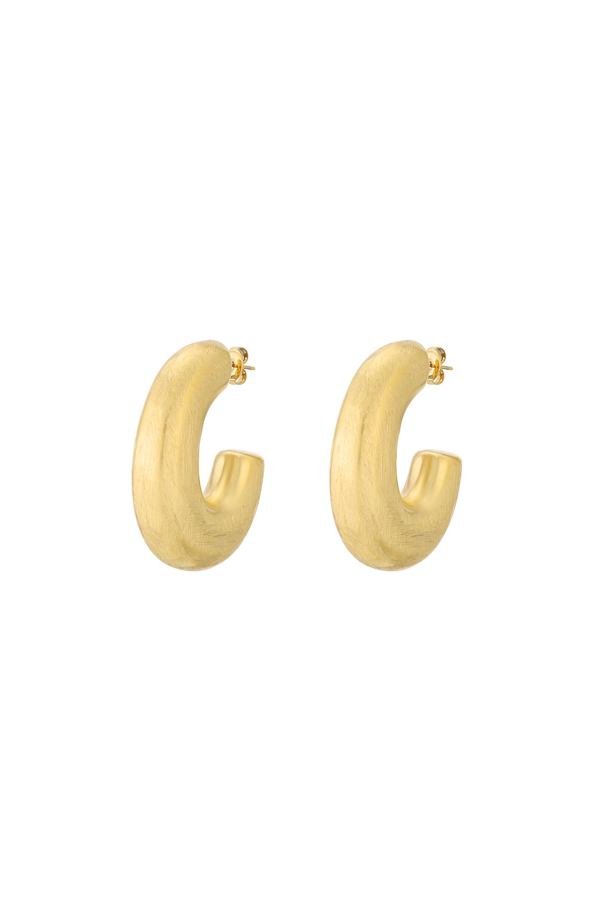 Pair of chunky brushed gold hoop earrings with thick tube design isolated on white background