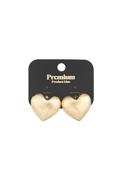 Brushed gold heart stud earrings displayed on a black Premium Product Line card