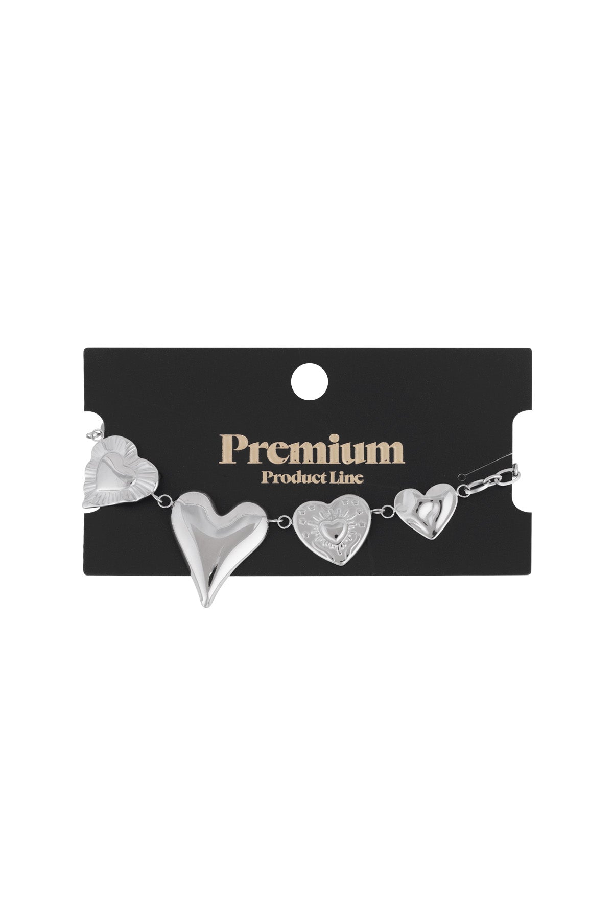 Silver chunky heart charm bracelet displayed on a black 'Premium Product Line' card packaging