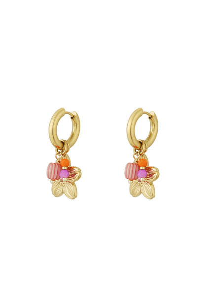Pair of gold-tone hoop earrings adorned with playful floral charms and colourful pink, orange, and purple beads on white background