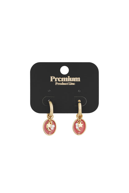 Gold-tone hoop earrings with pink enamel crescent moon and star charms displayed on black premium product card