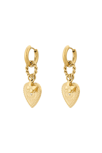 Studio image of gold heart charm hoop earrings with butterfly detail on white background