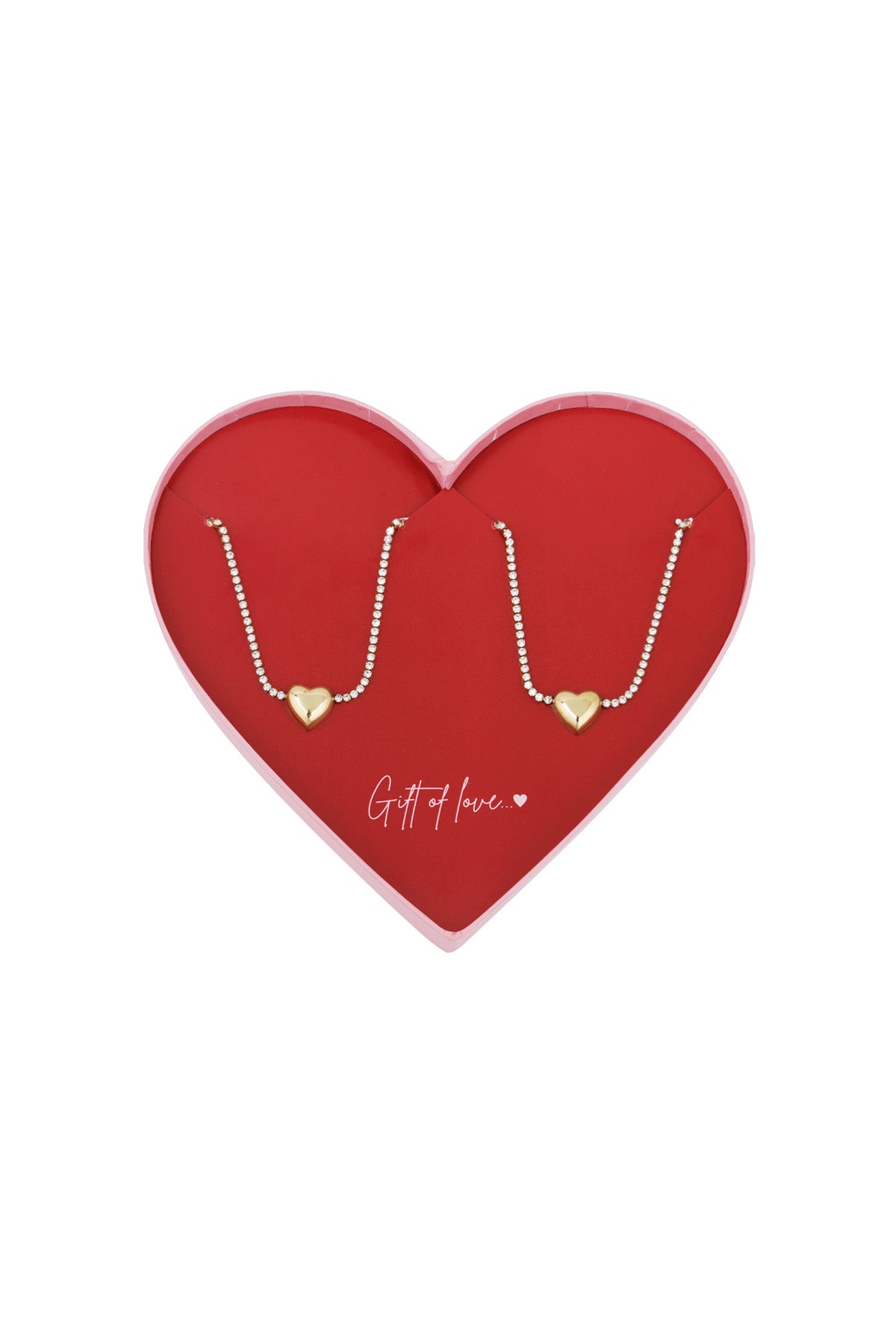 Twin heart charm bracelets with gold-tone heart pendants and sparkling crystal chain displayed on a red heart-shaped box with 'Gift of love...' text