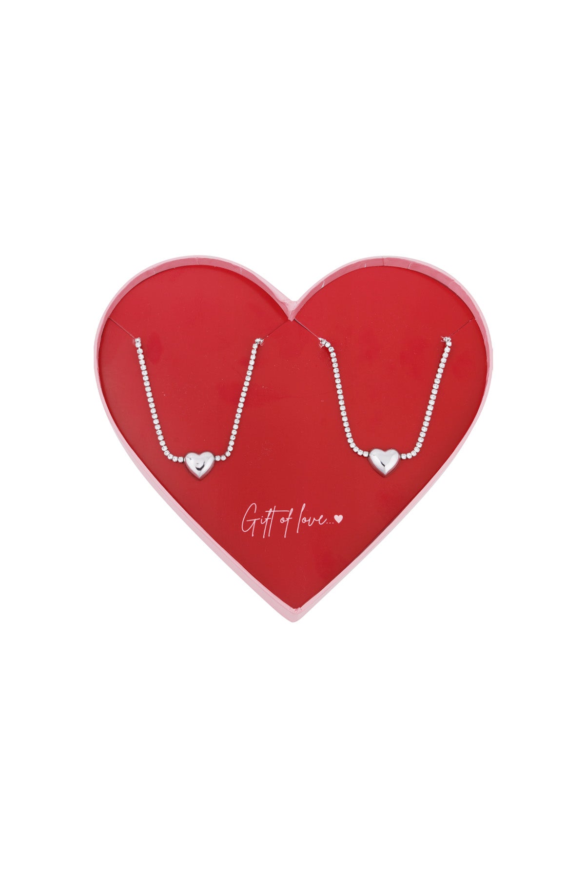 Two delicate stainless steel bracelets with heart charms displayed side by side in a red heart-shaped gift box with 'Gift of love...' text