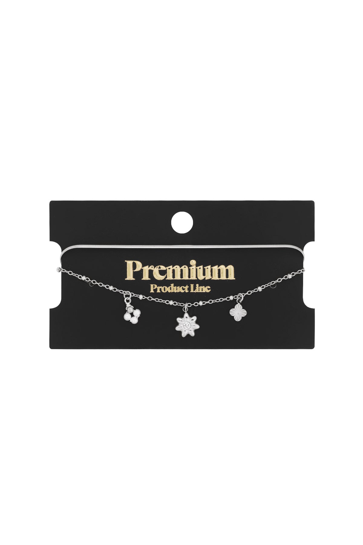 Silver floral charm bracelet on black packaging card with Premium Product Line label