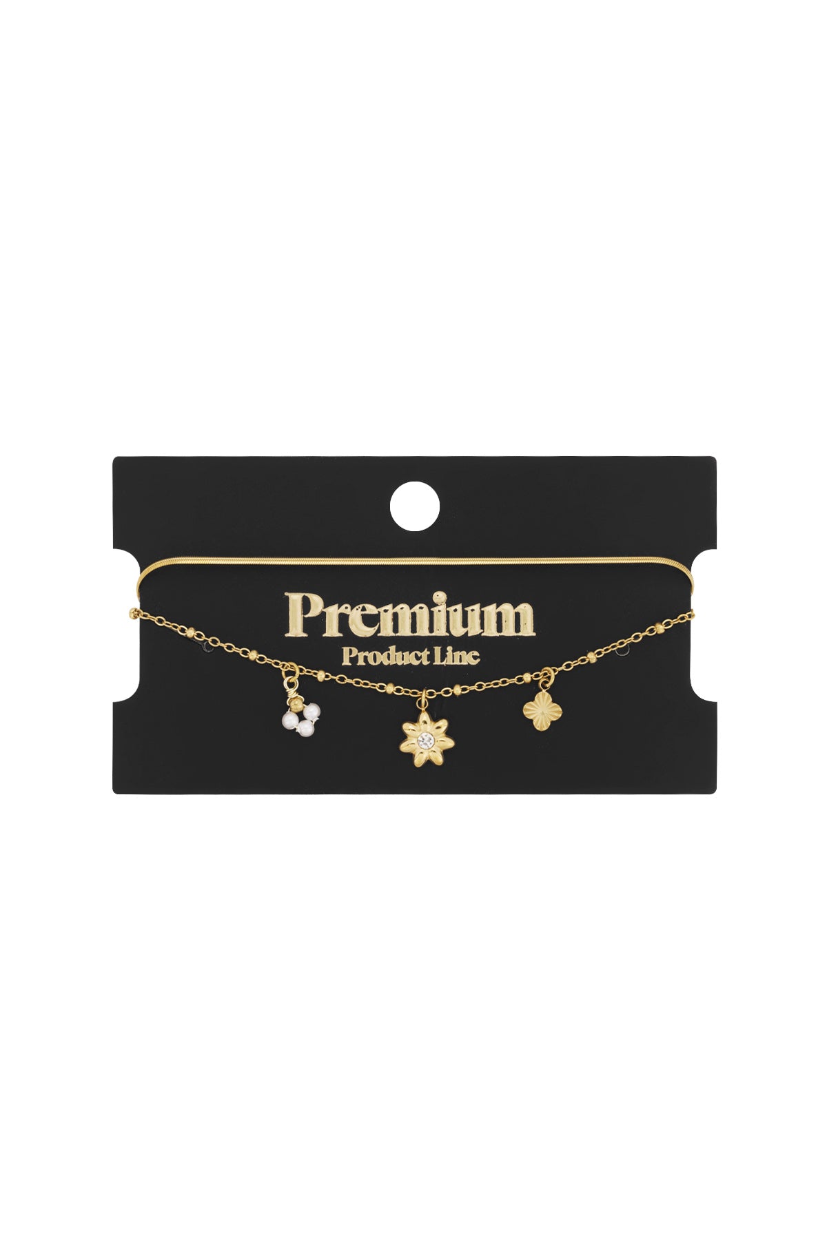 Gold layered floral charm bracelet on black packaging card with Premium Product Line label