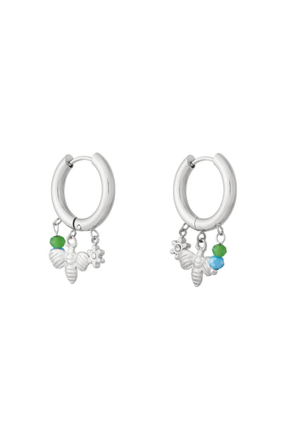Silver charm hoop earrings with bee, flower charms and green-blue beads