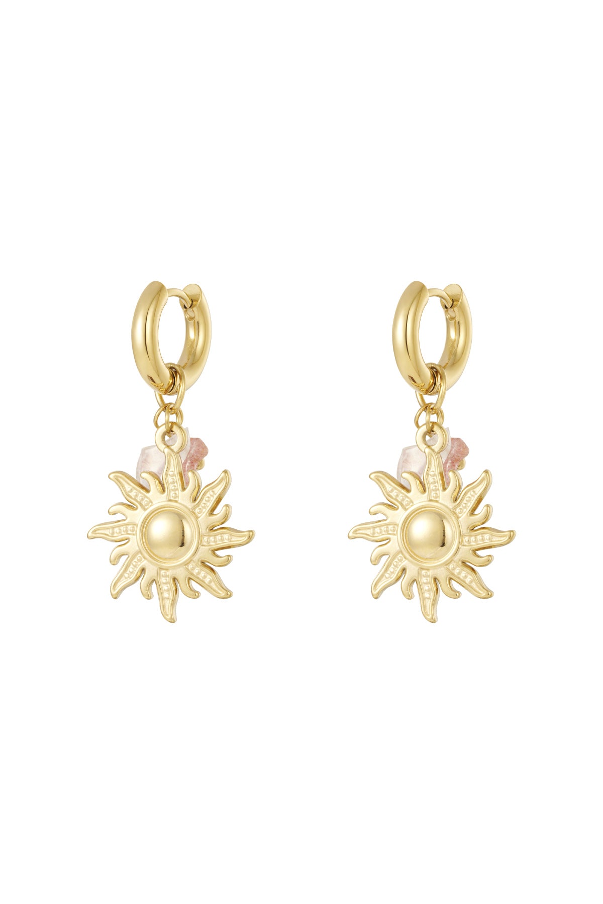 Pair of gold sun charm drop earrings with pink bead accents displayed on white background