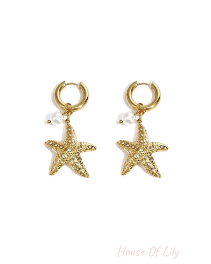 Earrings with starfish and pearl