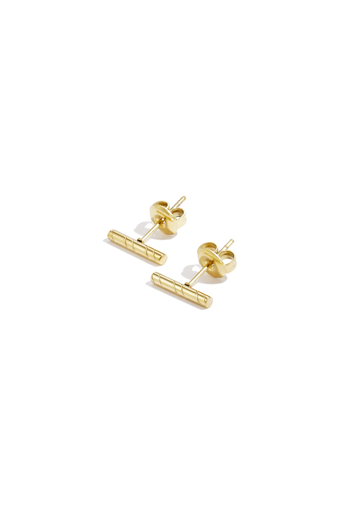 Gold minimalist bar stud earrings with diagonal line pattern on white background