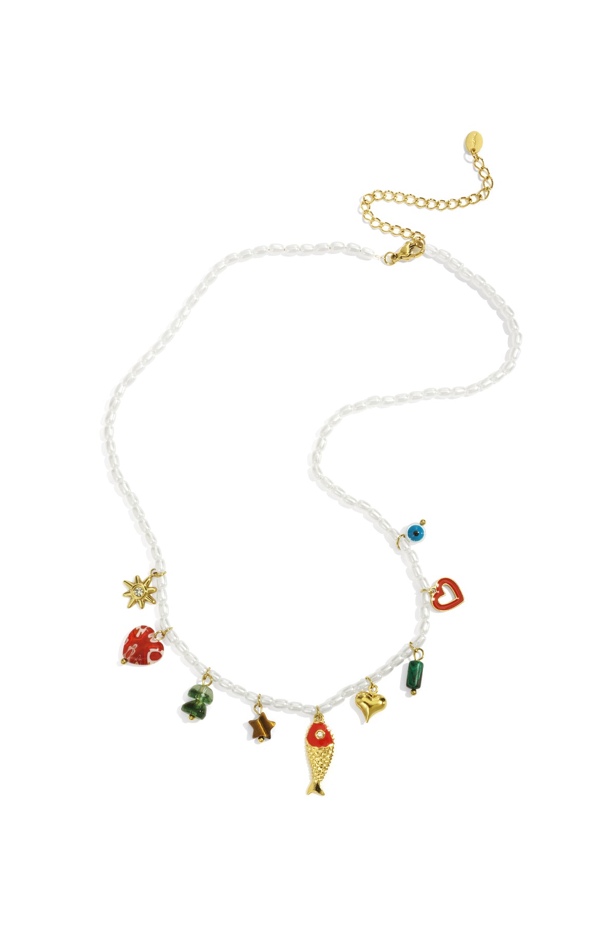 Close-up of a white beaded necklace with colorful gold-tone charms including fish, hearts, and stars