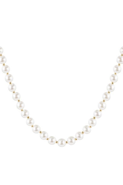 Close-up of pearl white glossy acrylic beaded necklace with gold spacers on white background
