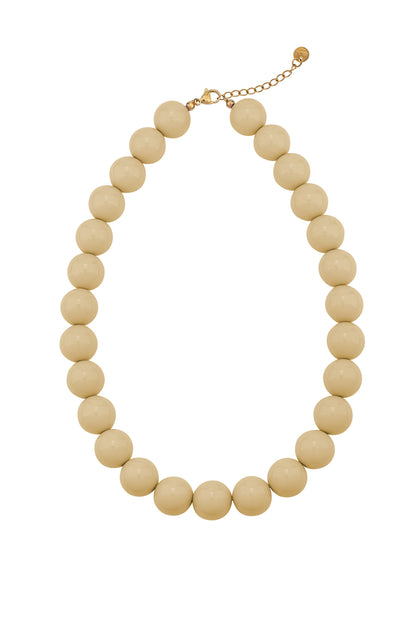 Chunky beige beaded necklace with large, glossy round beads on a gold-tone metal chain.